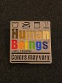 "Human Beings 100% Organic Colors May Vary" Pin