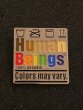 "Human Beings 100% Organic Colors May Vary" Pin